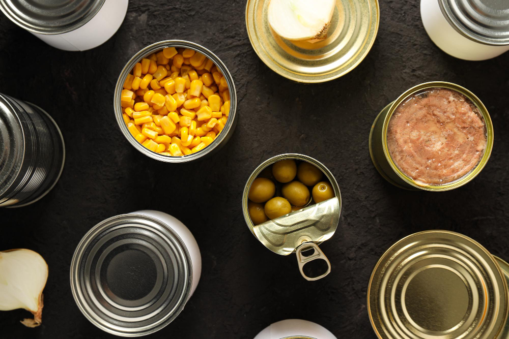 Cans of corn, olives, and tuna.