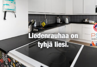 Tyhjä liesi keittiössä ja teksti Liedenrauhaa on tyhjä liesi.