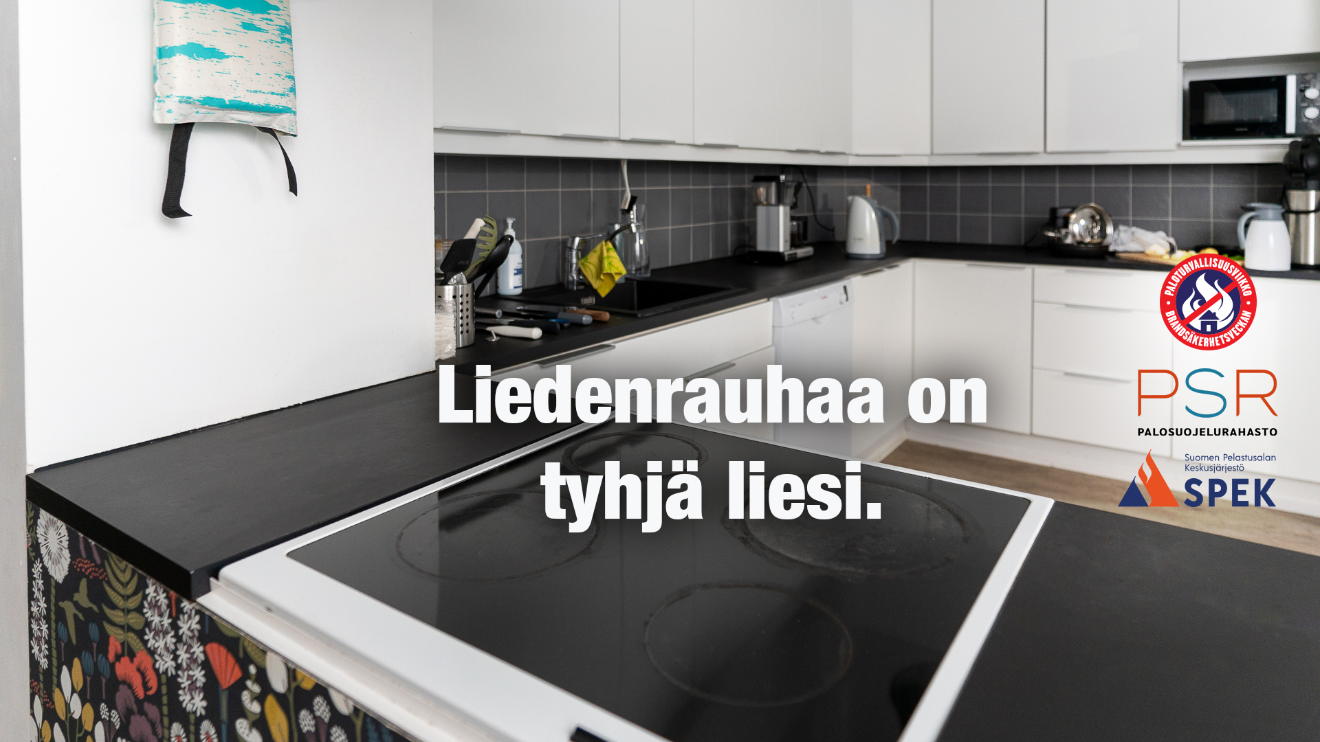 Tyhjä liesi keittiössä ja teksti Liedenrauhaa on tyhjä liesi.